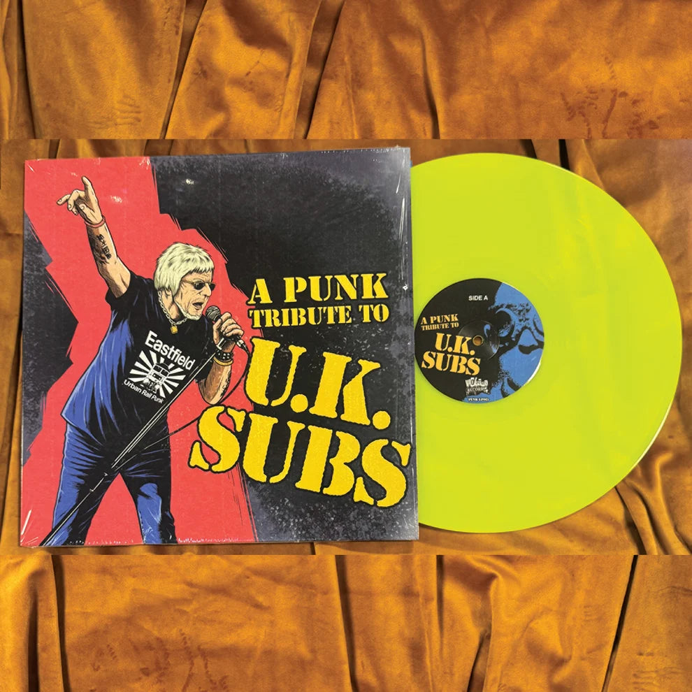 A Punk Tribute to U.K. Subs LP sleeve beside the neon yellow vinyl record